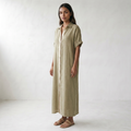 Gemma Linen Long Shirt Sundress - model three quarter front - master front reference - Higgsfield job f35a25b3-602f-4563-a2eb-9eed0ec98874